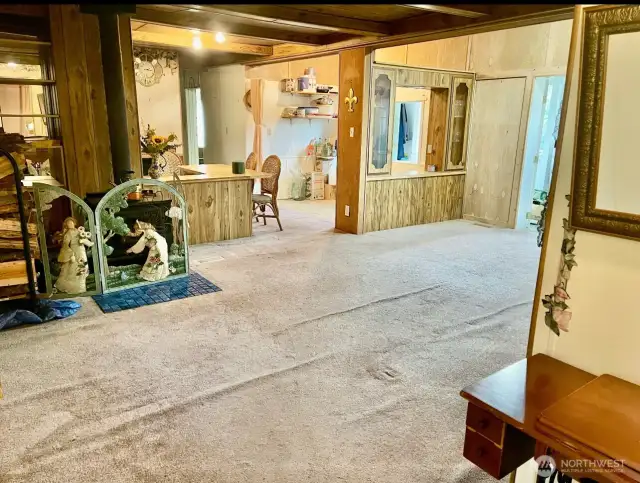 Living room into dining and kitchen area from front door.