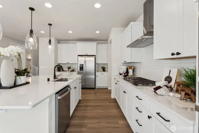 Photos are of the model home. Colors & finishes may vary.