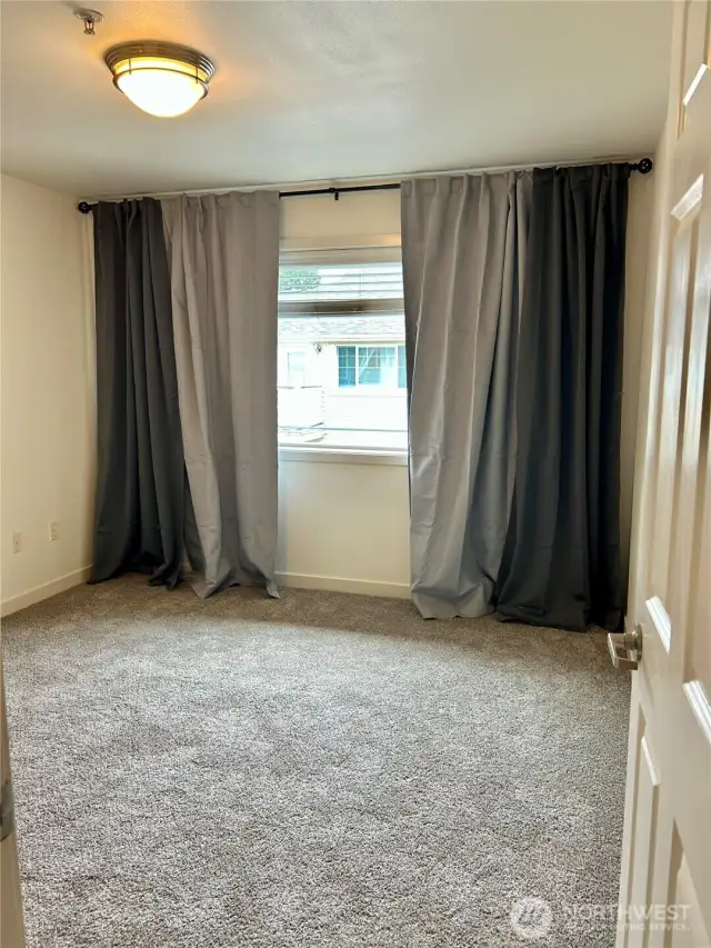 Primary bedroom has 2 closets and full bath.