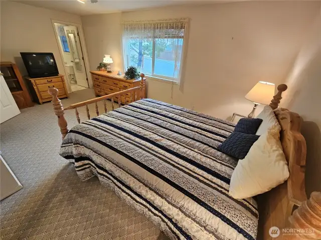 Large main bedroom with ensuite bathroom.