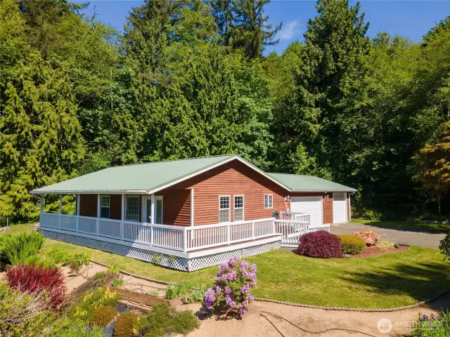 This beautiful rambler with a wrap around deck is a must see!
