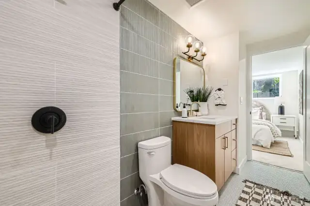 Primary Bathroom with Walk-In Shower, Designer Accent Tile & Penny Tile Floors