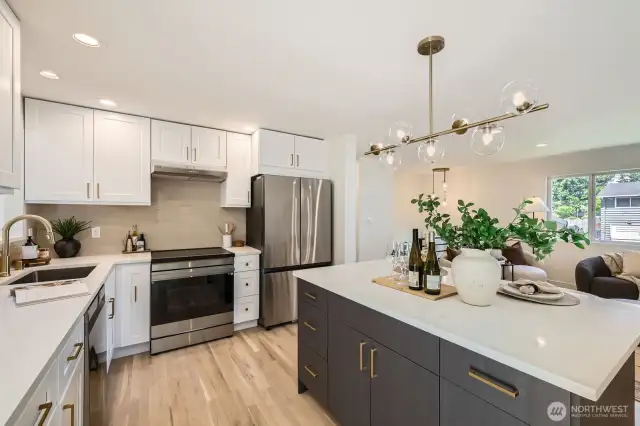 Open Concept Kitchen with Quartz Counters & Stainless Steel Appliances