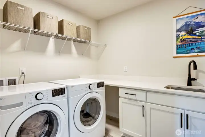Laundry with storage and sink