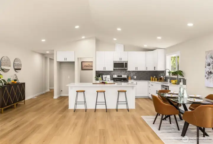 Brand new kitchen! Cabinets, quartz countertops, ss stove, oven, dishwasher, & sink!