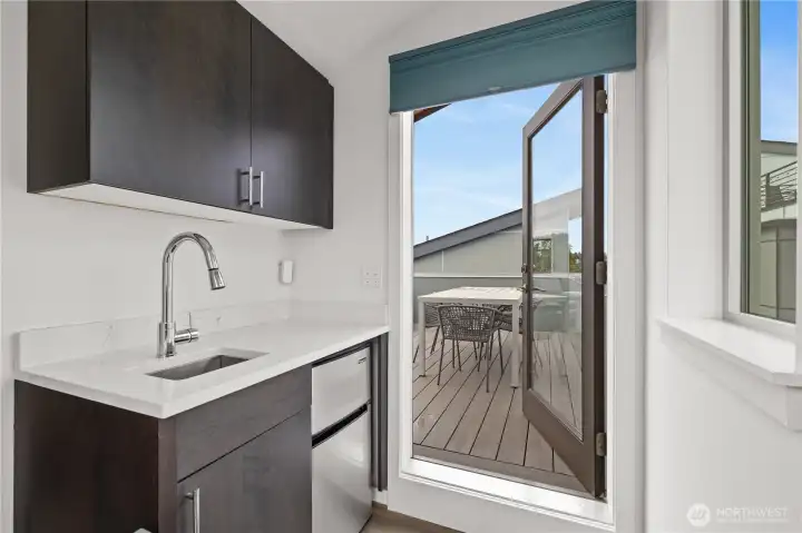 Wet bar next to rooftop deck
