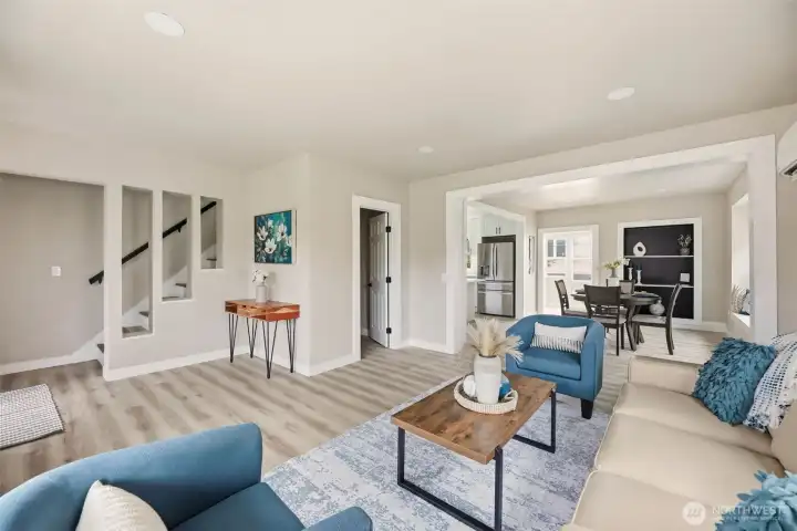 New interior paint throughout the home. Stairwell leads to two bedrooms and two baths upstairs.