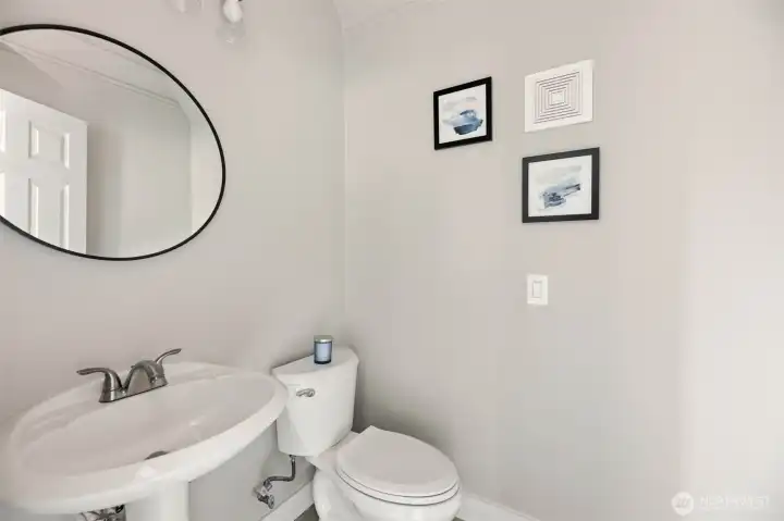 This half bath is conveniently located on the first floor right off the great room.