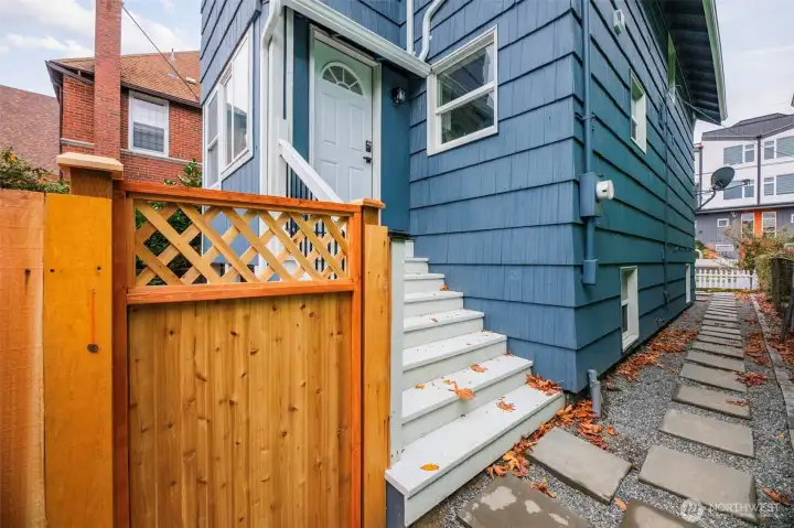 Back door to the home. Enter the gate to get to the private entrance to the basement.
