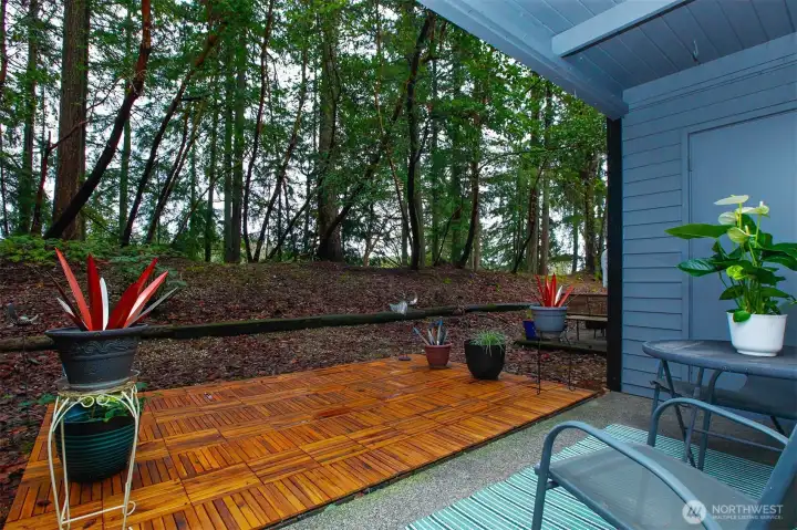 Private outdoor living with views of Chamber Creek greenbelt.