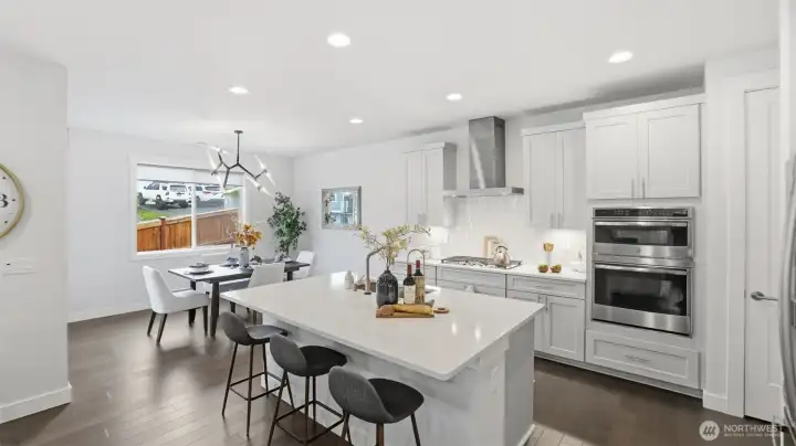 Chef-inspired kitchen with double ovens, gas cooking, and plenty of prep space for everyday meals.