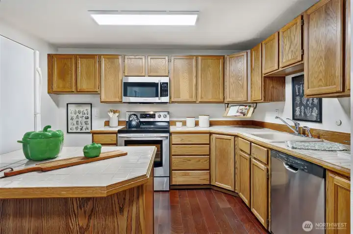 Modern kitchen with lots of cabinets & counter space.