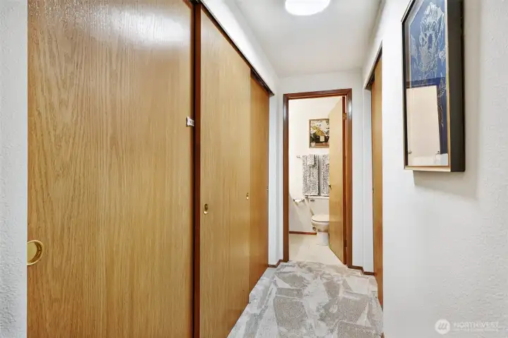 Primary suite wall of closets.