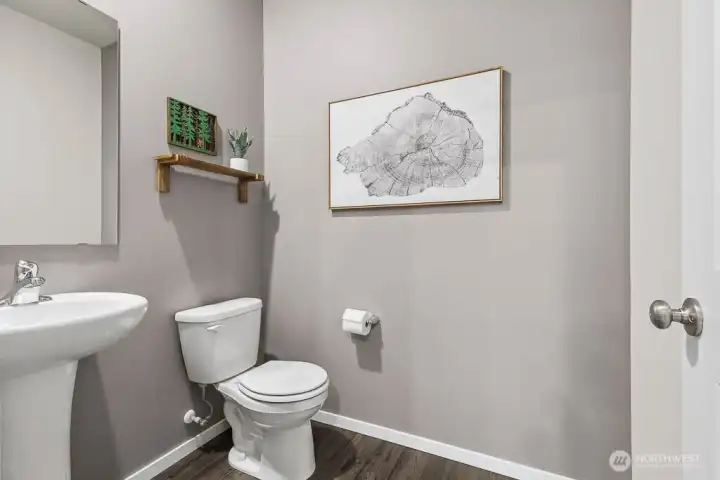 Powder room on the main floor. Photos are representative only and may display different color package and/or upgrades.