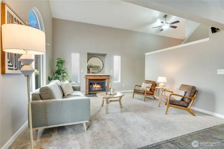 Beautiful fireplace anchors the room.