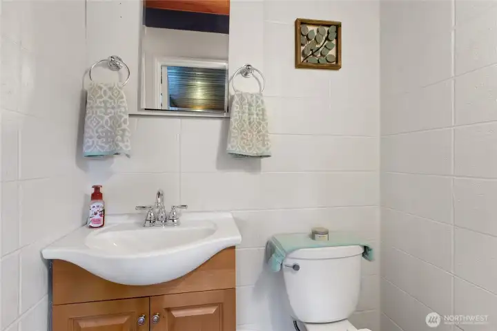 Half bath off family room.