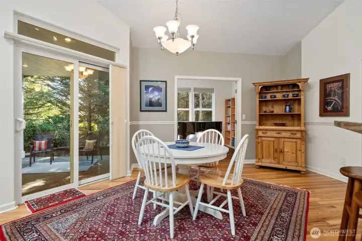 Dining area with sliding doors leading out onto the patio. Short trip from the kitchen out onto the patio for al-fresco dining.