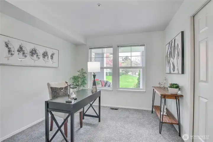 second bedroom, staged as office space