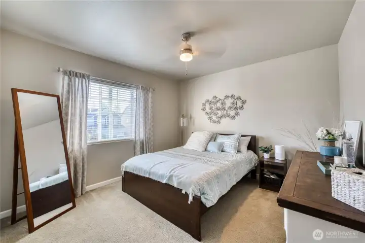 Additional bedroom is spacious. A nice retreat for for family or guests.
