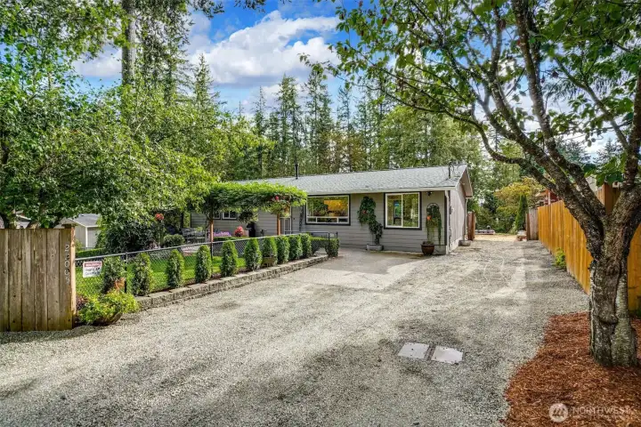 Fully updated rambler on larger site which has potential for detached buildings. Excellent neighborhood two blocks from Lake Sawyer park and boat launch. Across the street from Waterfront properties.