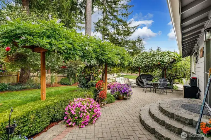 Front Patio, flower gardens. This is one of the nicest neighborhooods in the entire area.