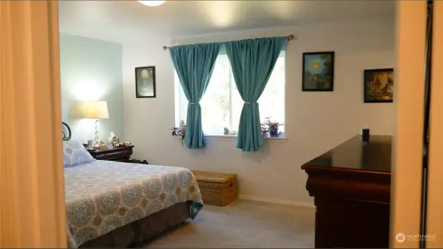 Primary bedroom is large and bright!