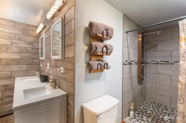 Primary Bathroom features a massive walk-in shower. Make this your zen place to be.