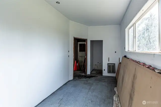 Back room in the garage is plumbed for a bathroom