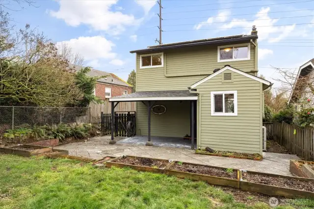 Raised-bed garden and yard.