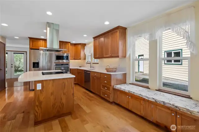 Sunny breakfast nook with lots of storage.