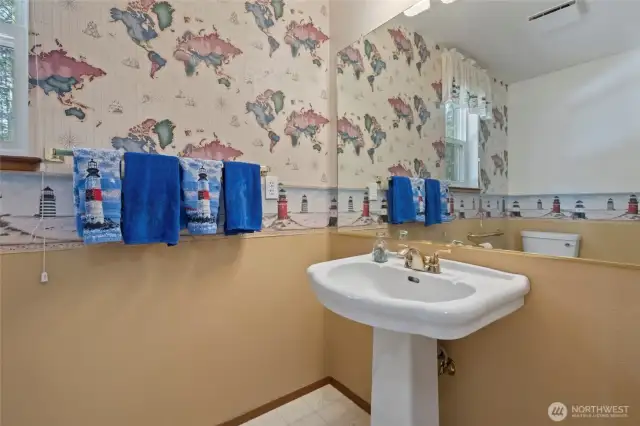 Main floor half bathroom off the kitchen.