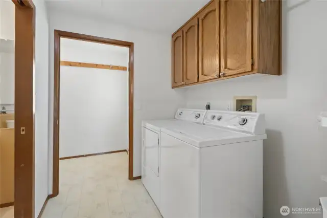 Utility room is conveniently off the kitchen.