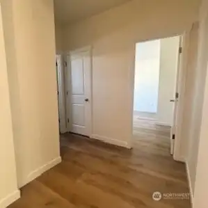 Hall to 4th Bedroom + Bath on Main/Floor 1