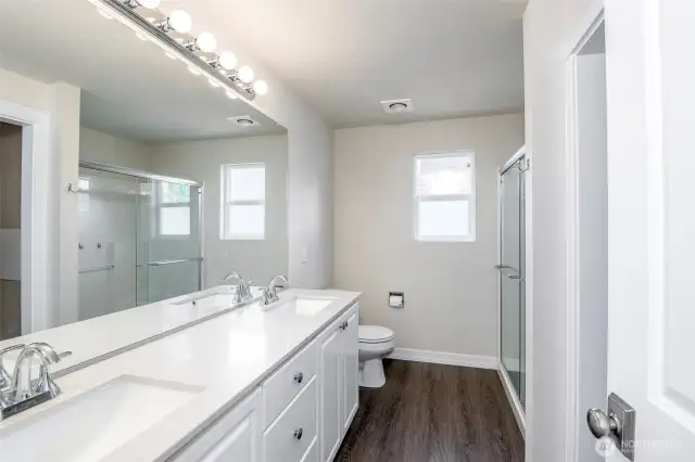 Primary Bath with walk-in closet to the right