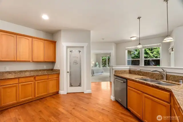 The large kitchen has tons of counter and cabinet space, plus a walk in pantry