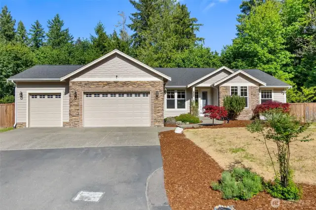 New exterior paint, a three car garage and newly hydro-seeded lawn....the green is coming!
