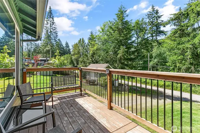 Front deck offers a bird's eye view over the green spaces that Glenhaven offers. This new deck is a great space for morning coffee and listening to the birds in the trees.
