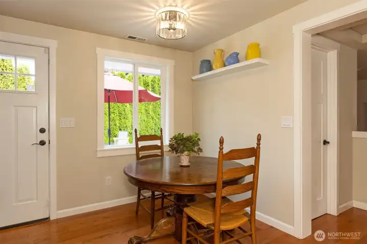 Eating space leads to outside patio and open to living room
