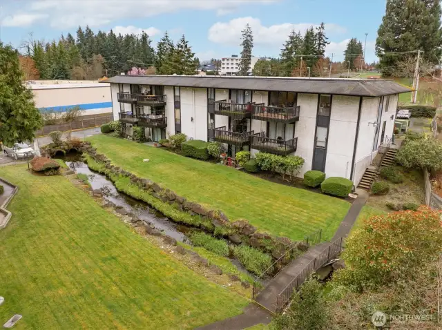 Welcome to Casa Del Ray and condo 321 - top right corner of the building. Casa Del Ray while close to retail is set on lush grounds.