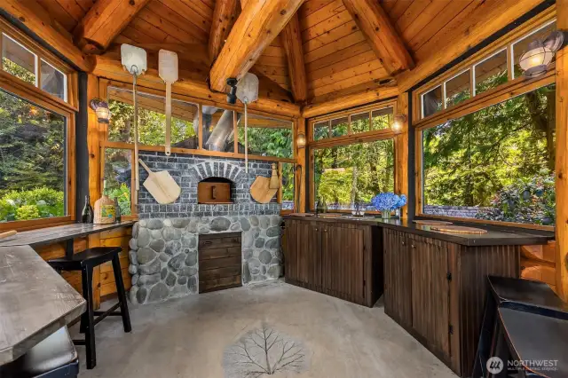 The interior of the “pizza hut” is a work of art, from the stamped concrete floor to the wood-fired oven, to the pizza-making tools. What culinary delights will you create and serve to your loved ones?