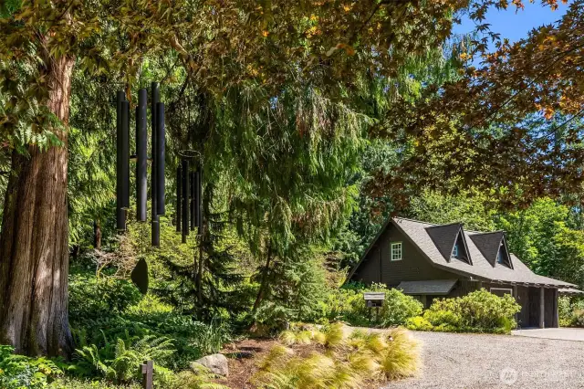 The giant wind chimes hanging from an old cedar offer their soothing, deep tones when the breeze catches them just right. Visitors also delight in giving them go, so don’t be shy!