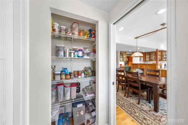 Generously sized pantry off of dining room for additional storage.