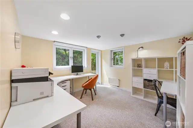 Bright downstairs corner bedroom with access to backyard.