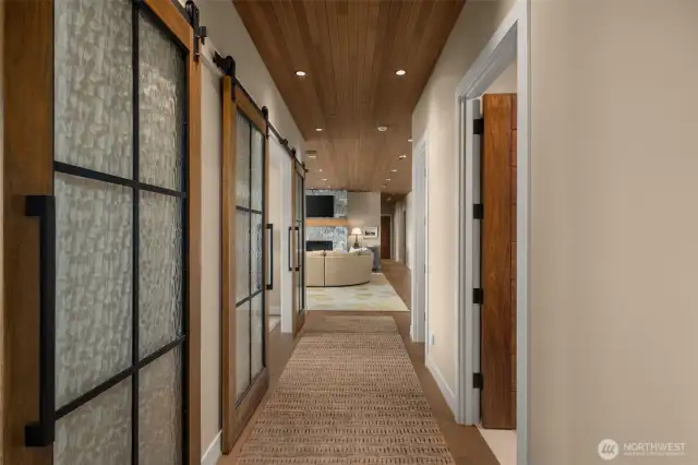 Custom barn doors add warmth and ambiance to the NW stylings.