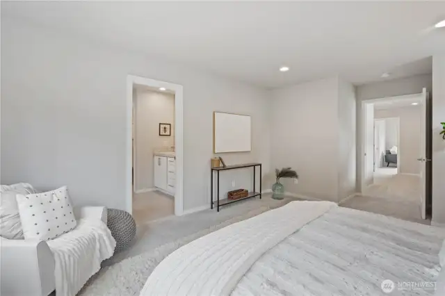 Primary bedroom is complemented with a luxurious en-suite primary bathroom.