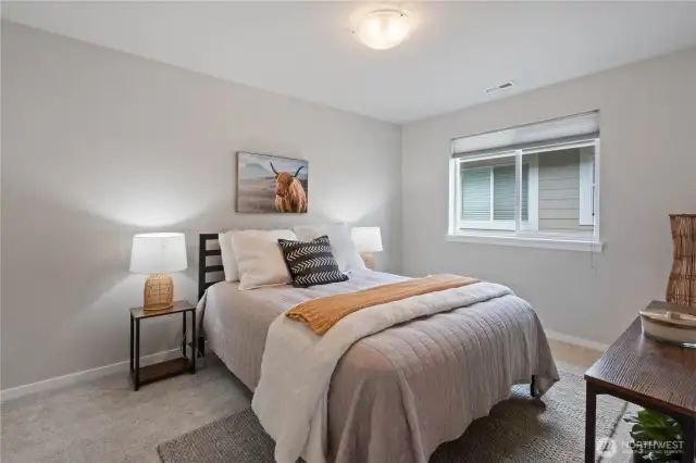 Bedroom #3 is at the end of the hallway, giving it more privacy away from the shared spaces.