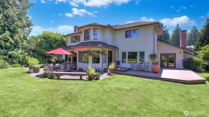 Enjoy this generous outdoor living space designed for dining, lounging, and entertaining in style. Thoughtful plantings to provide year-round color.