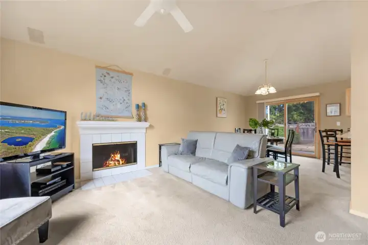 Living room & dining room with sliding glass doors that lead to the back yard.