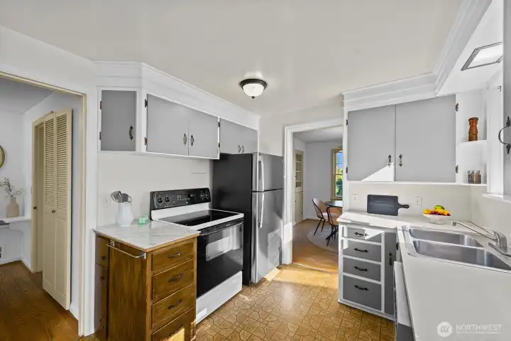 Kitchen with back door, and little built in kitchen nook