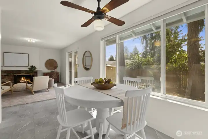 Cozy nook eating area looks to park like back yard.